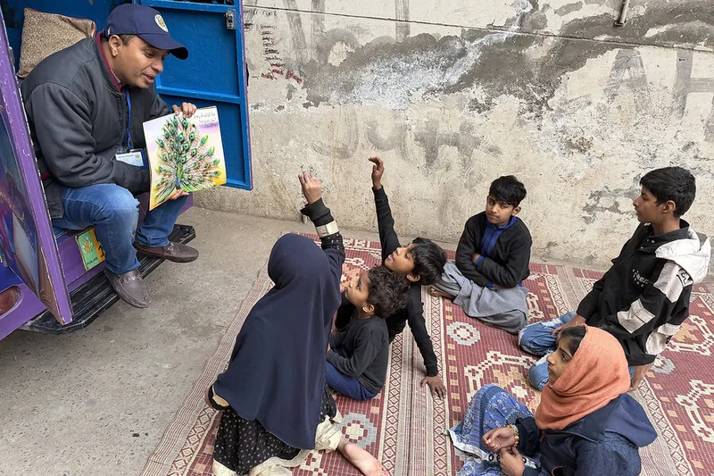 Via camel, rickshaw, whatever it takes, this nonprofit brings libraries to children