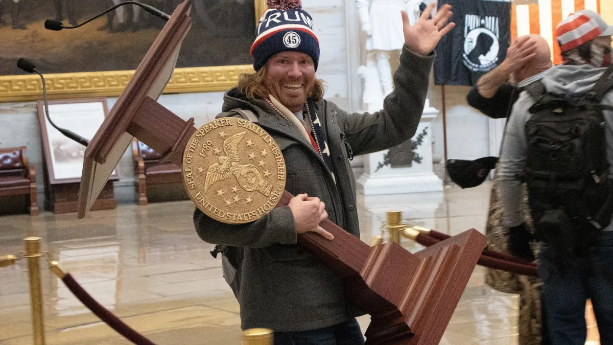 He took Pelosi’s lectern on Jan. 6. Now he’s running for office. 