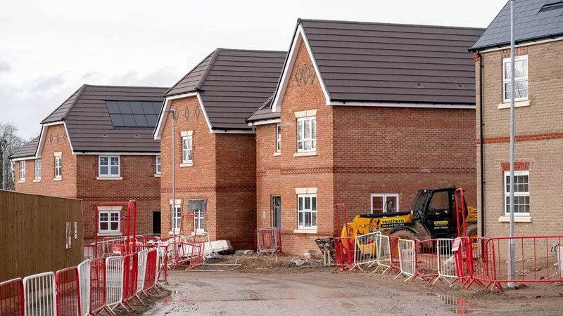 Berkeley shares tumble as housebuilder cuts profit forecast and halts land purchases 