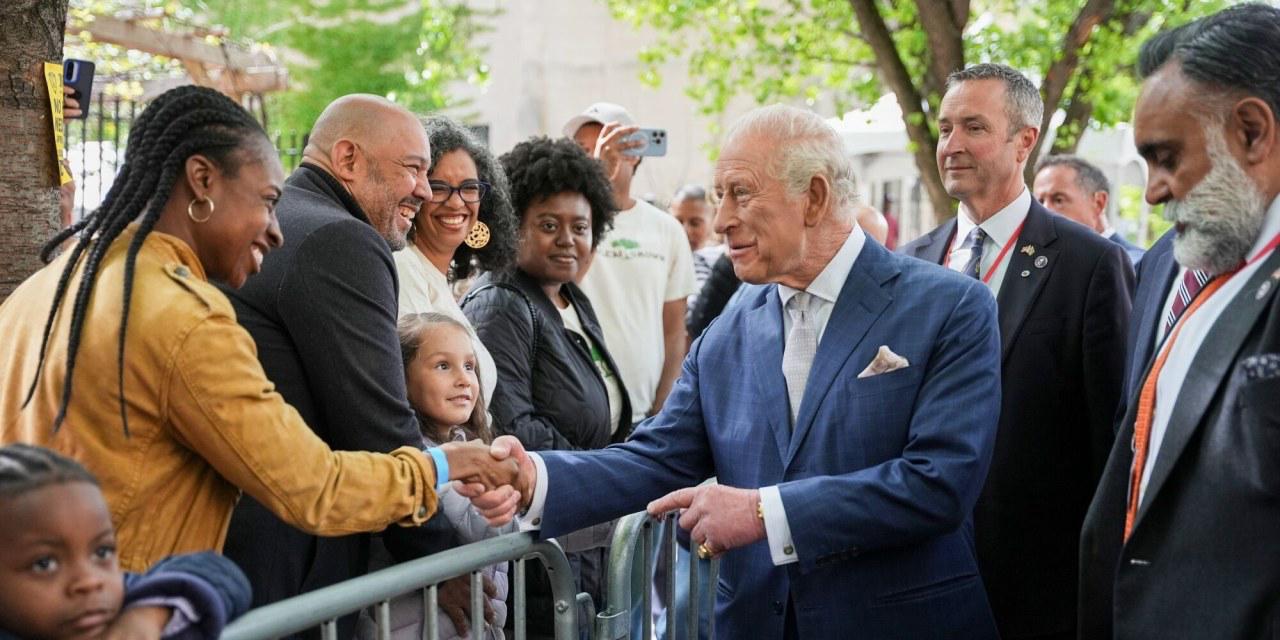 What Brings Feuding Americans Together? A King, It Turns Out