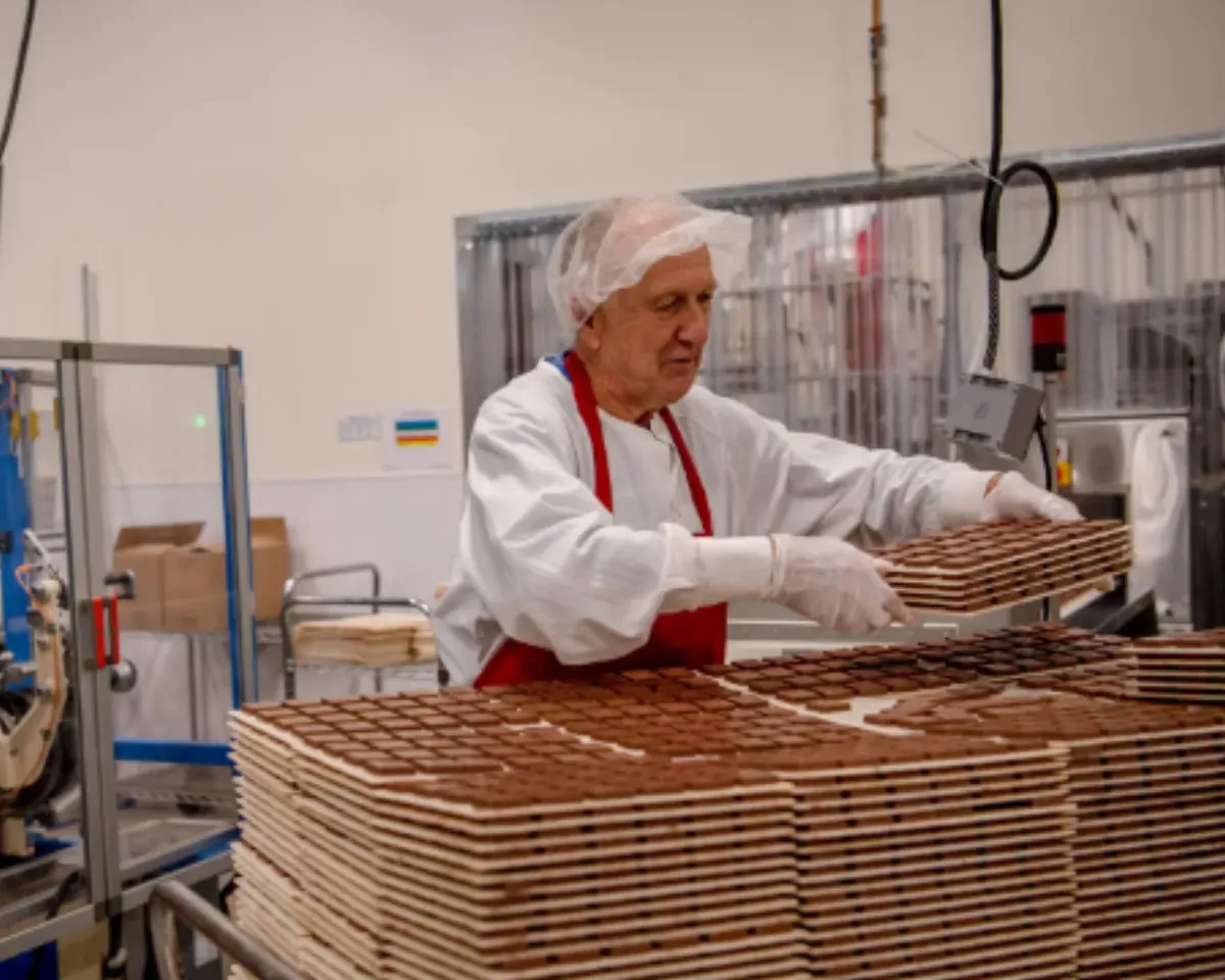 At Lake Champlain Chocolates, the owners take shifts stacking boxes in the warehouse. At Burlington Bagel Bakery, a sign in the window advertises wages starting at $25 an hour.