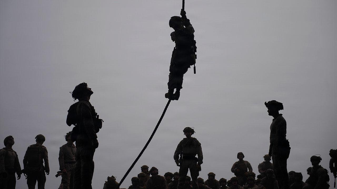 How would American ground forces take Kharg?