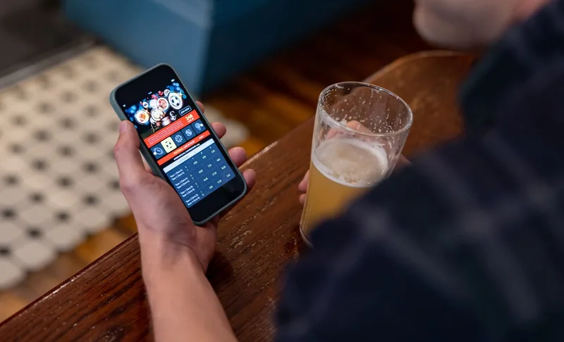Sports gambling could be boosting binge drinking in young men